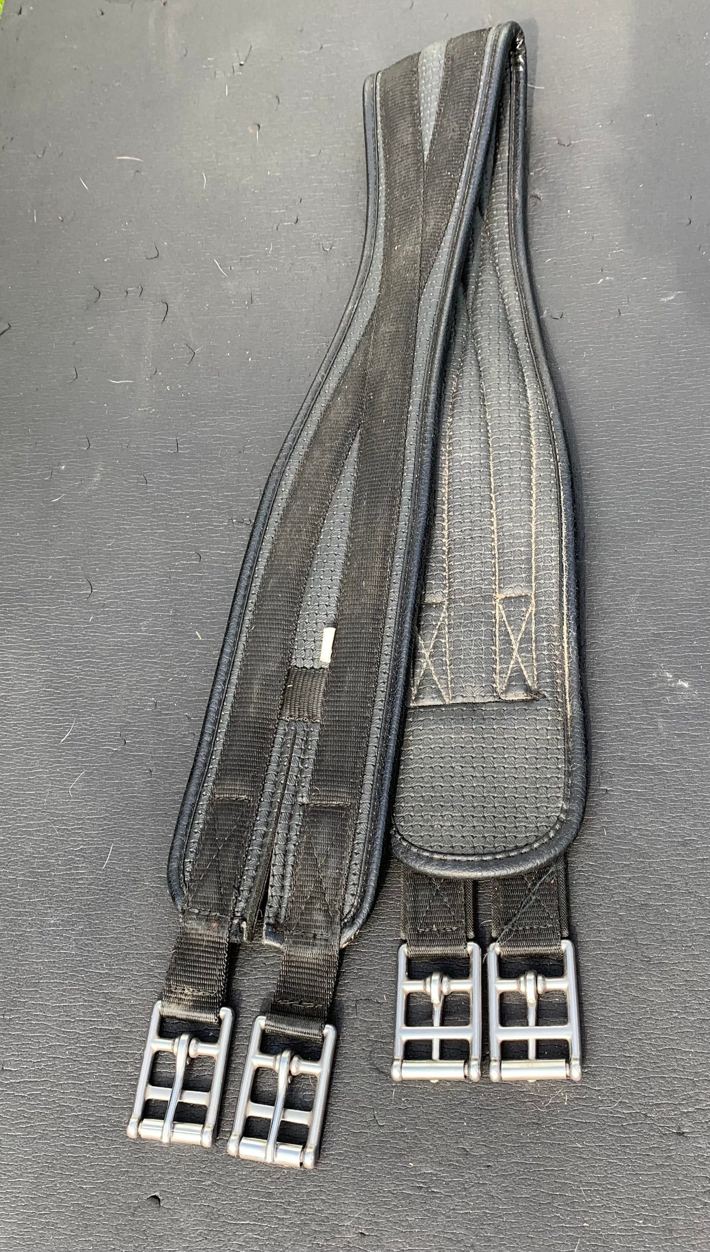 Black synthetic 46” anatomical/shaped girth elasticated at one end
