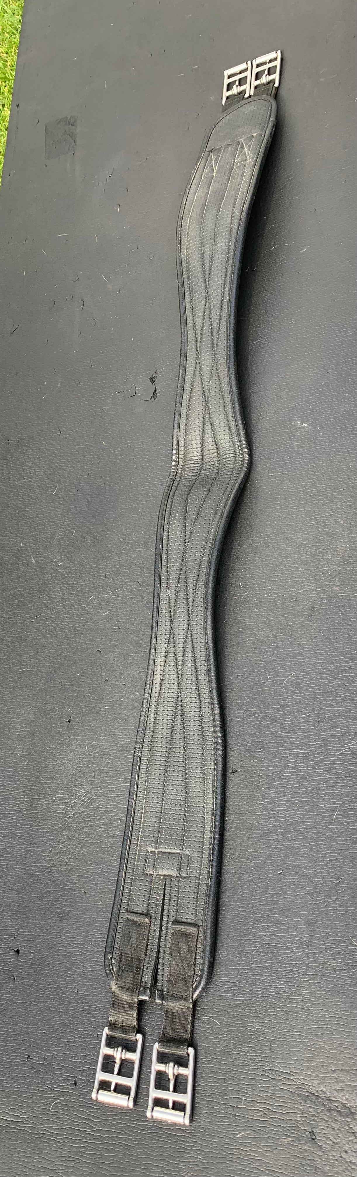 Black synthetic 46” anatomical/shaped girth elasticated at one end