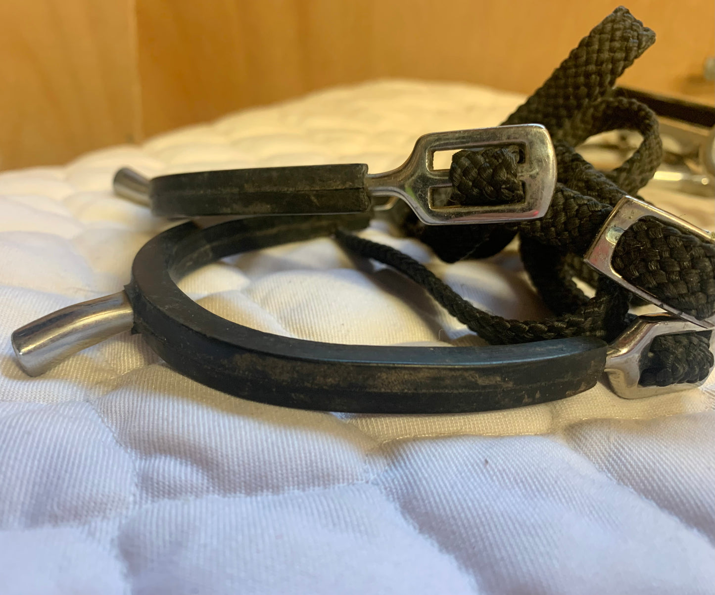 Black lightweight rubber covered spurs