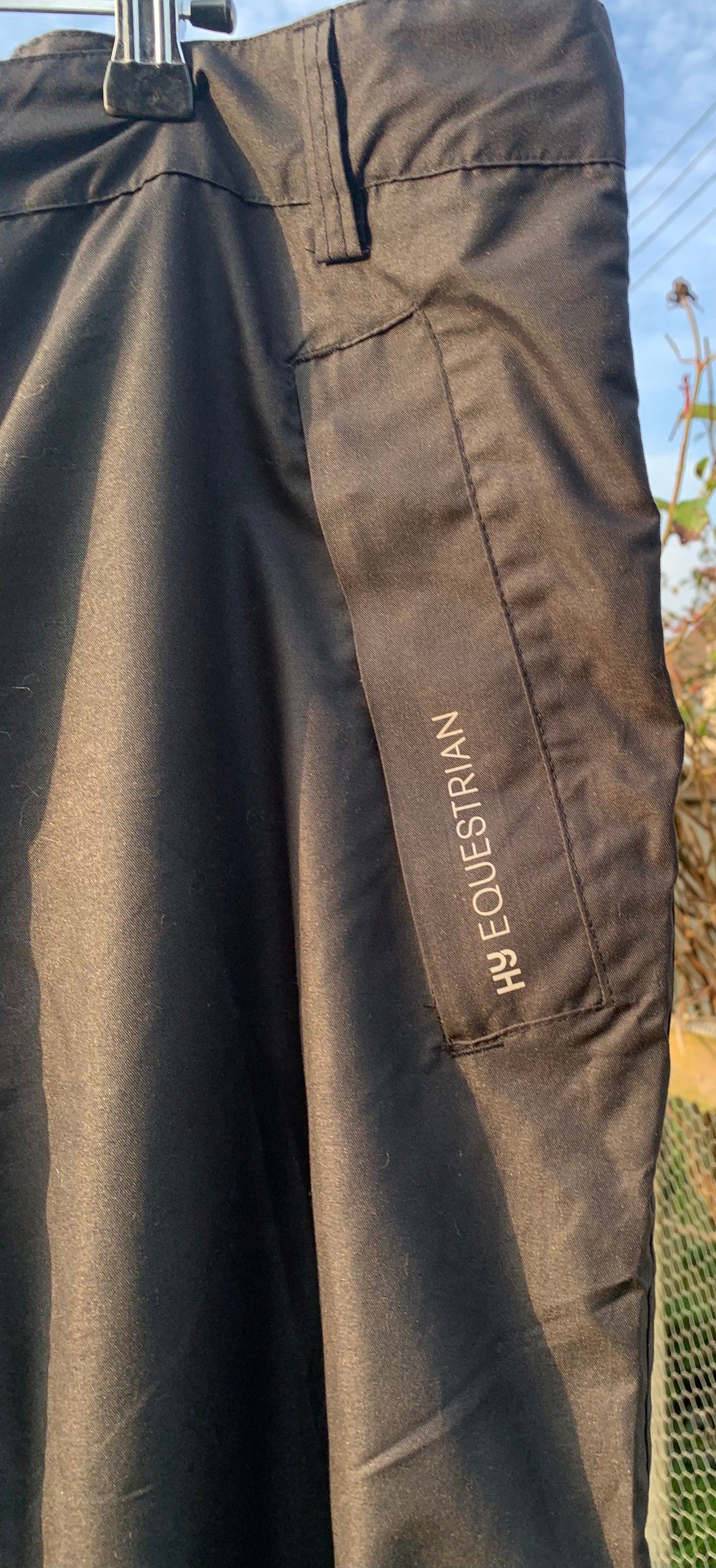 New with tag black reflective HY Equestrian size large Fully waterproof reflective ride-on over trousers