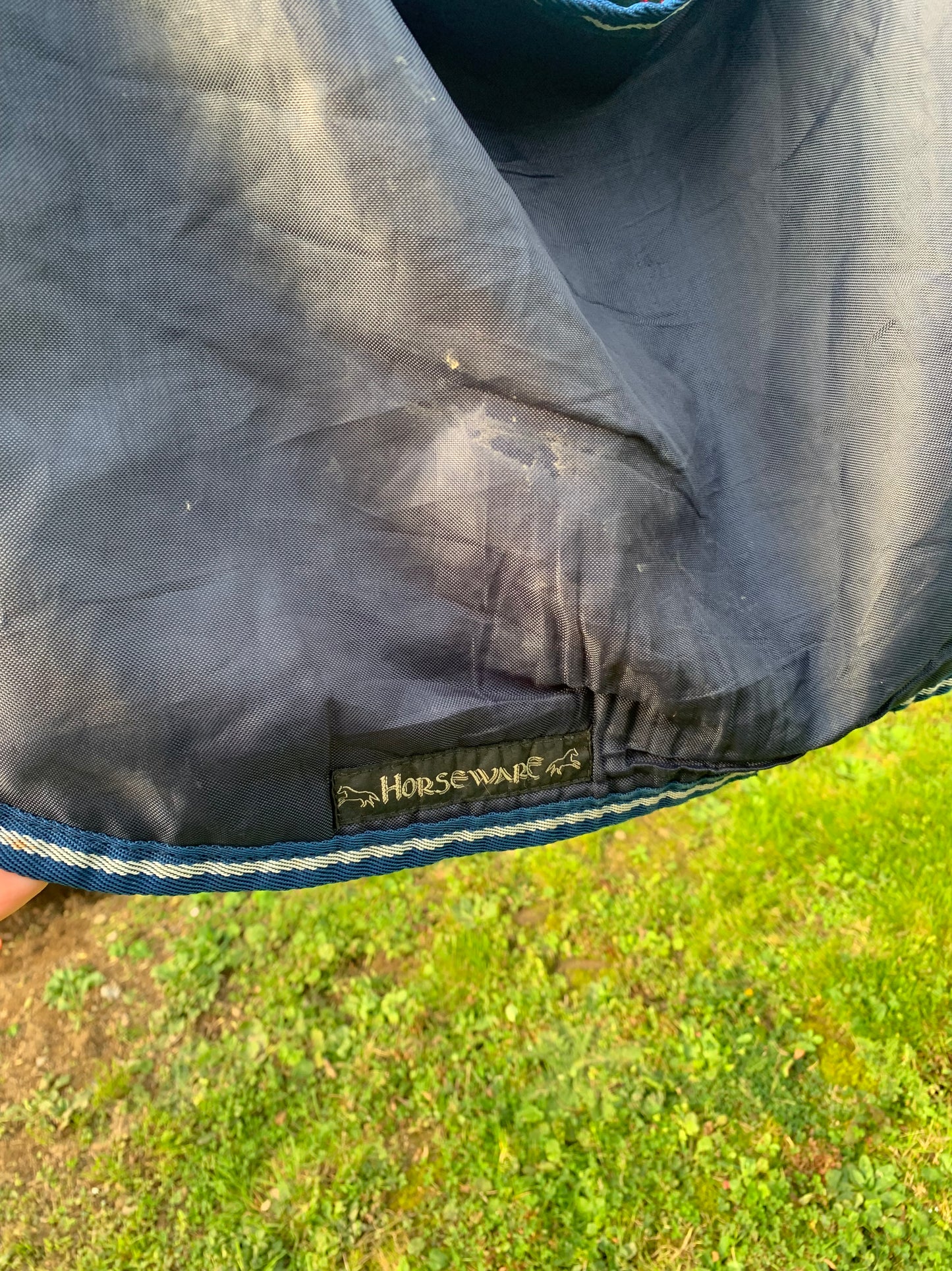 Showerproof Rhino Competition Exercise Sheet with a checked lining, complete with reflective strips 4’11”