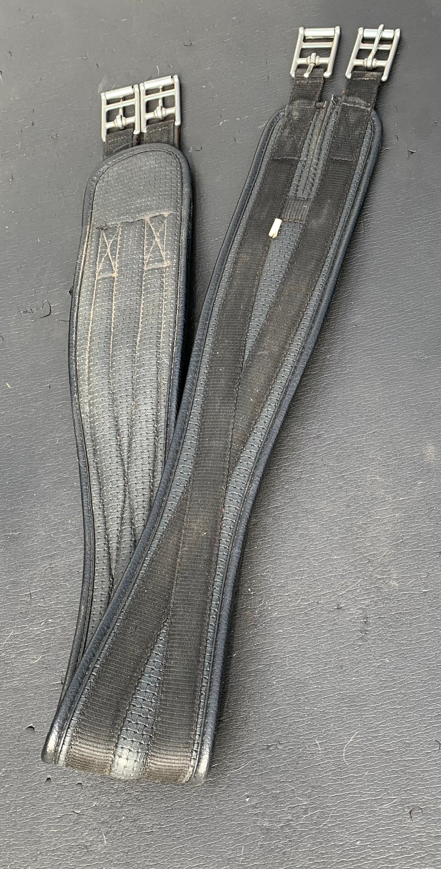Black synthetic 46” anatomical/shaped girth elasticated at one end