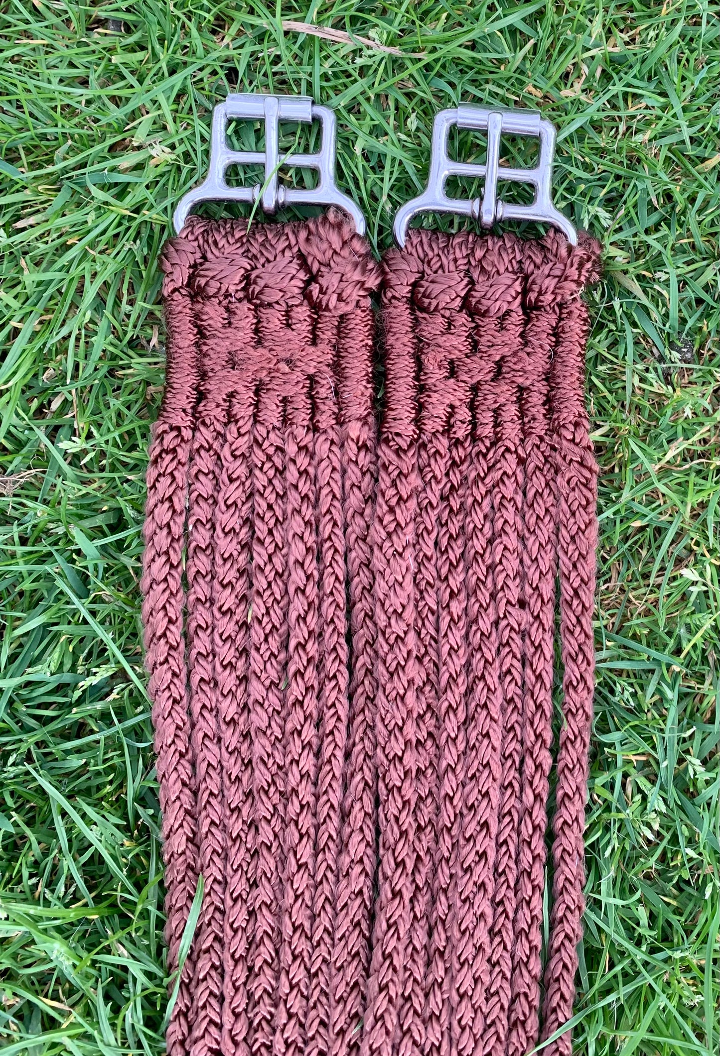 49” Brown Stubben string anti chafing girth 14 strands of non chafing nylon and roller buckles