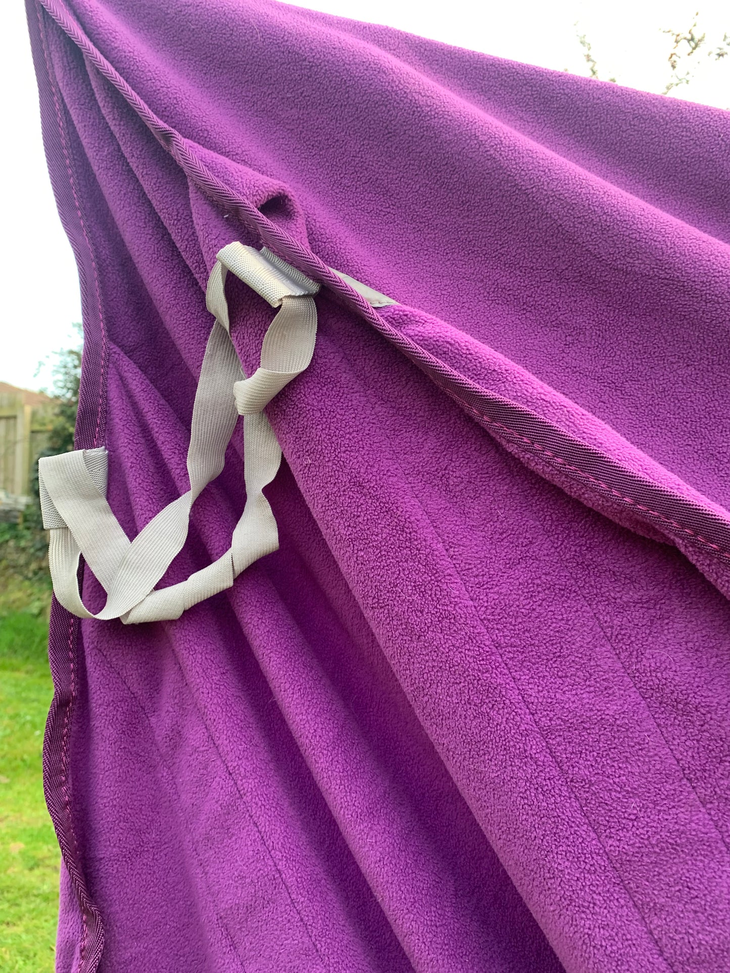 Size large/full (4’ 11”) purple Harrison Howard exercise fleece rug with reflective strips