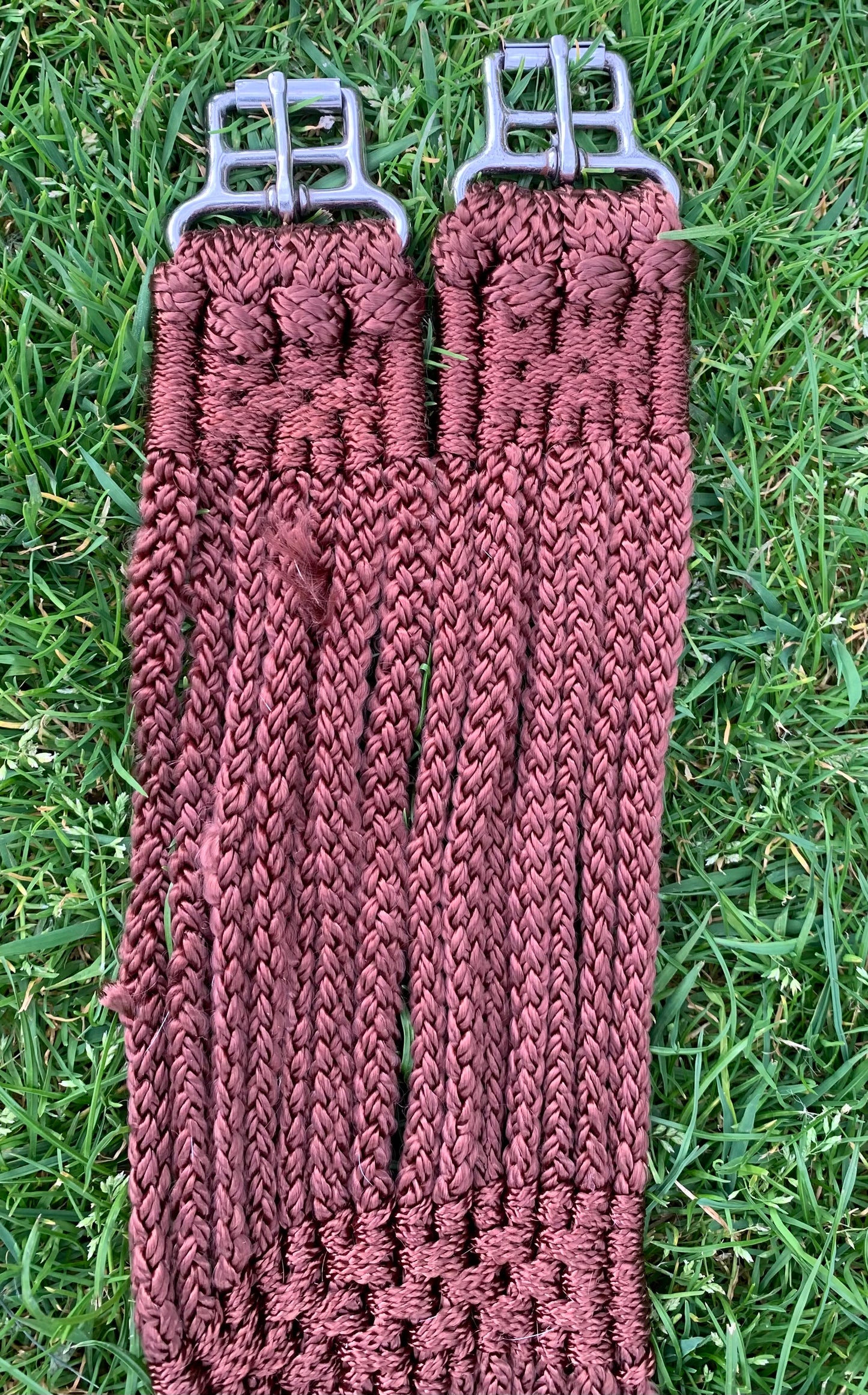 49” Brown Stubben string anti chafing girth 14 strands of non chafing nylon and roller buckles