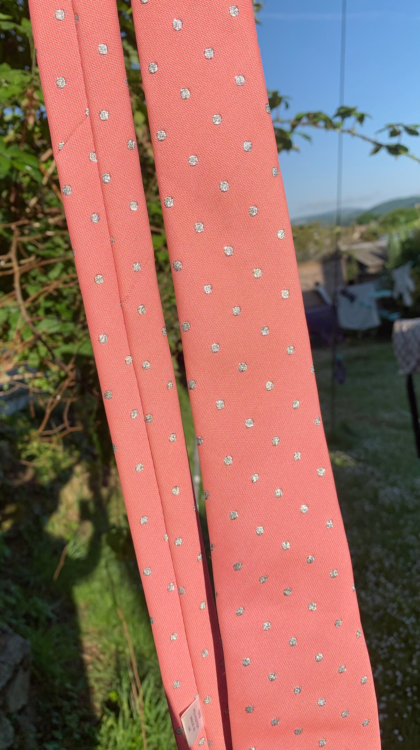 Pink with silver dots showquest showing tie approx 52” in length