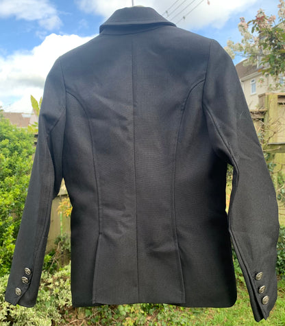 Child’s black HKM show jacket 7-8 years
