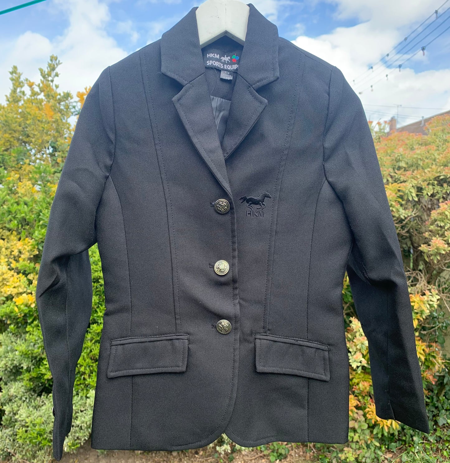 Child’s black HKM show jacket 7-8 years