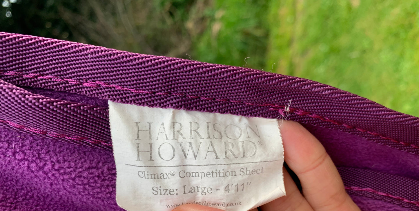 Size large/full (4’ 11”) purple Harrison Howard exercise fleece rug with reflective strips
