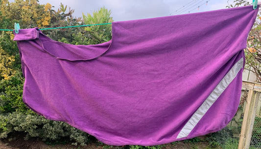 Size large/full (4’ 11”) purple Harrison Howard exercise fleece rug with reflective strips