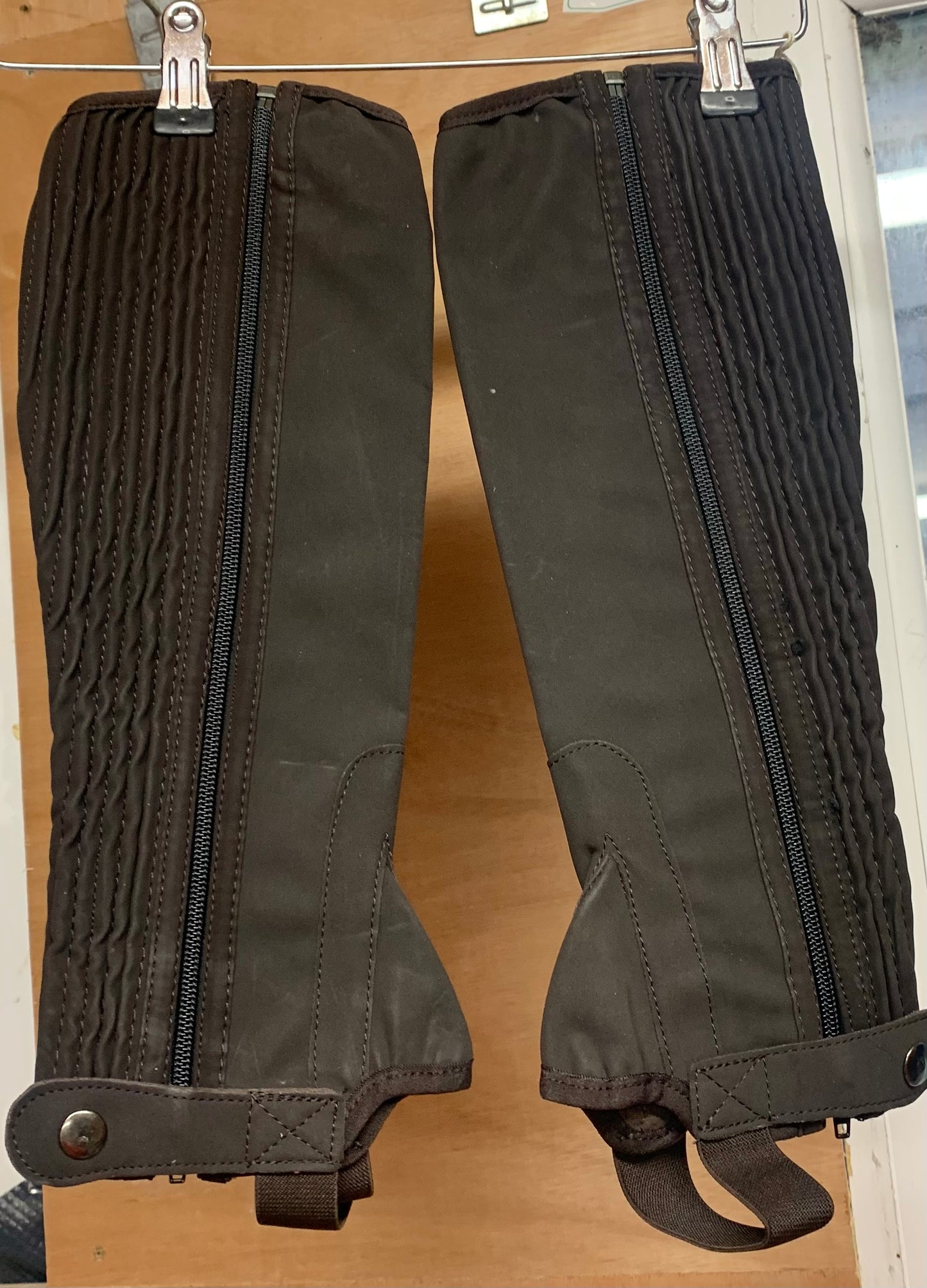 New in original packaging Childs size large brown washable half chaps