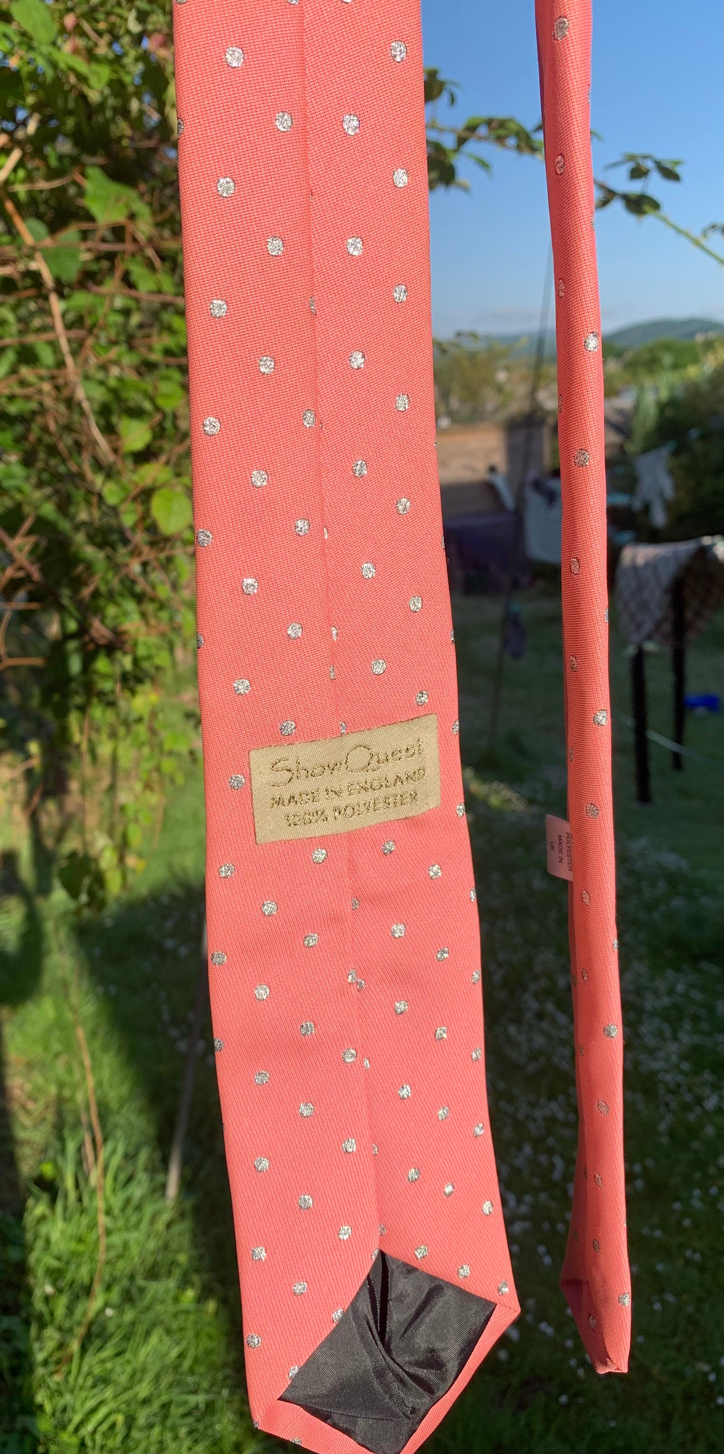 Pink with silver dots showquest showing tie approx 52” in length