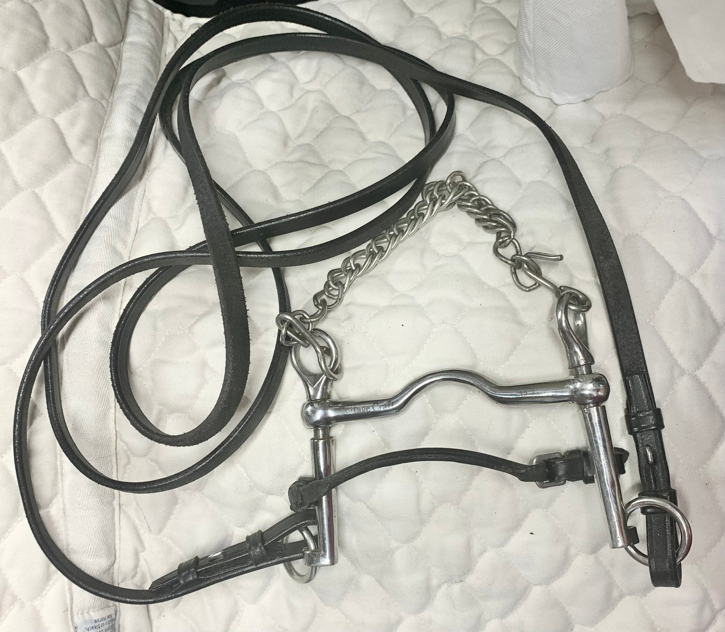 5” ported Weymouth sliding cheek Pelham with lip strap & 54” black leather double bridle reins