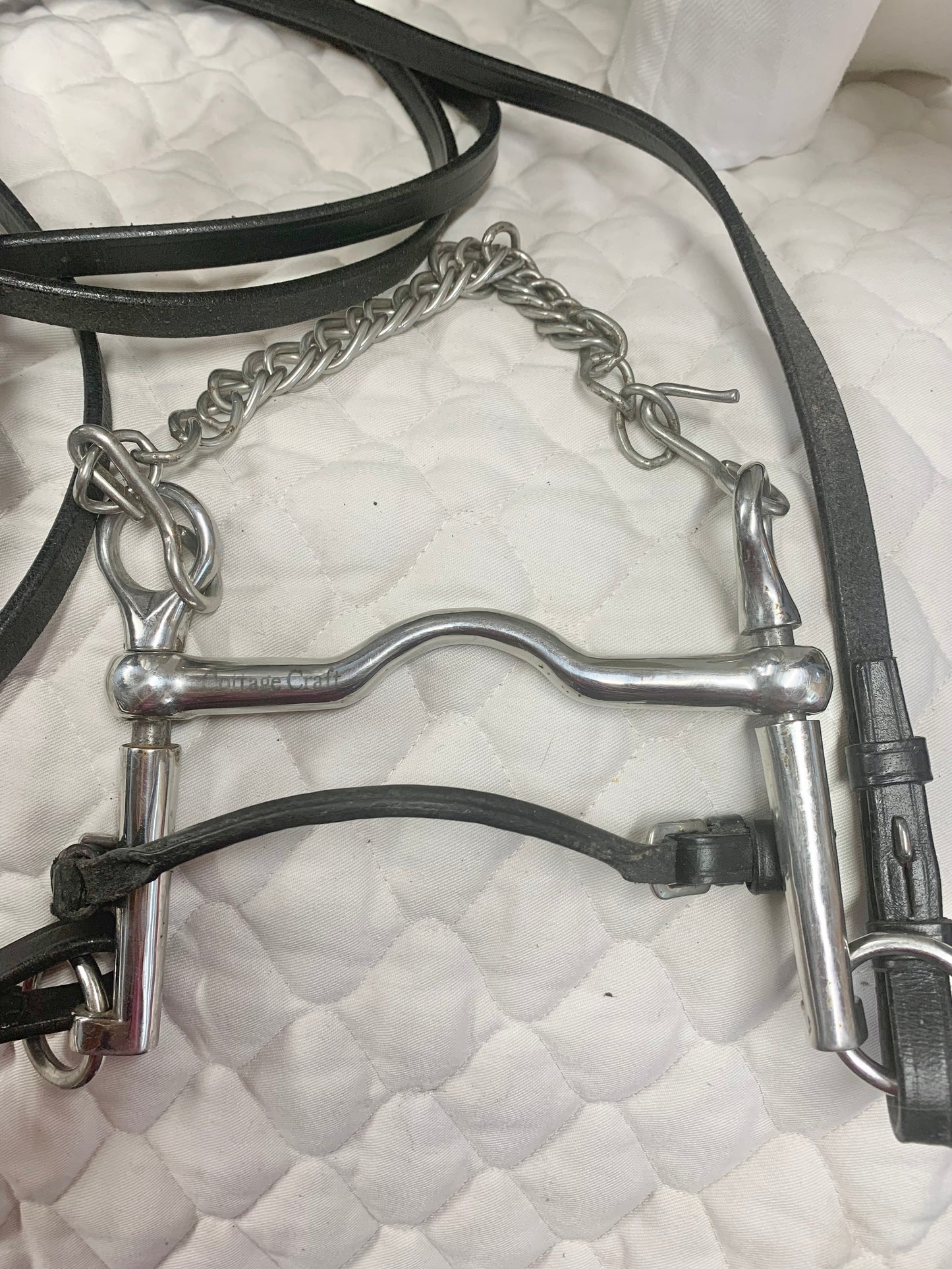 5” ported Weymouth sliding cheek Pelham with lip strap & 54” black leather double bridle reins
