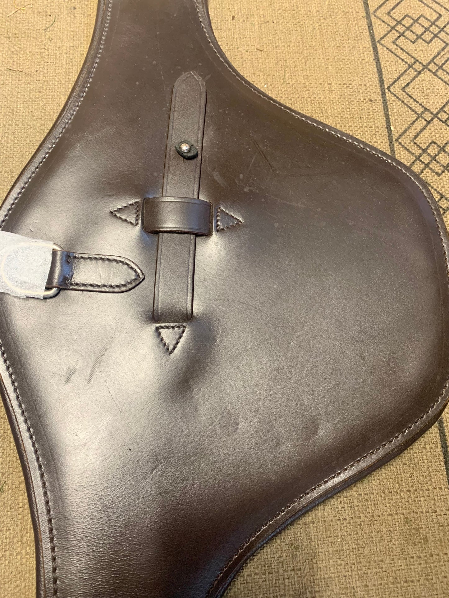 Unused gallop 38” brown padded leather stud girth 

Padded underside and elasticated straps, with roller buckles