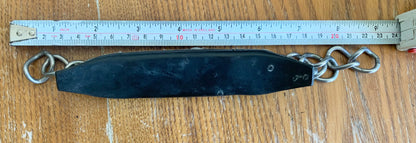 Curb chain with black rubber guard