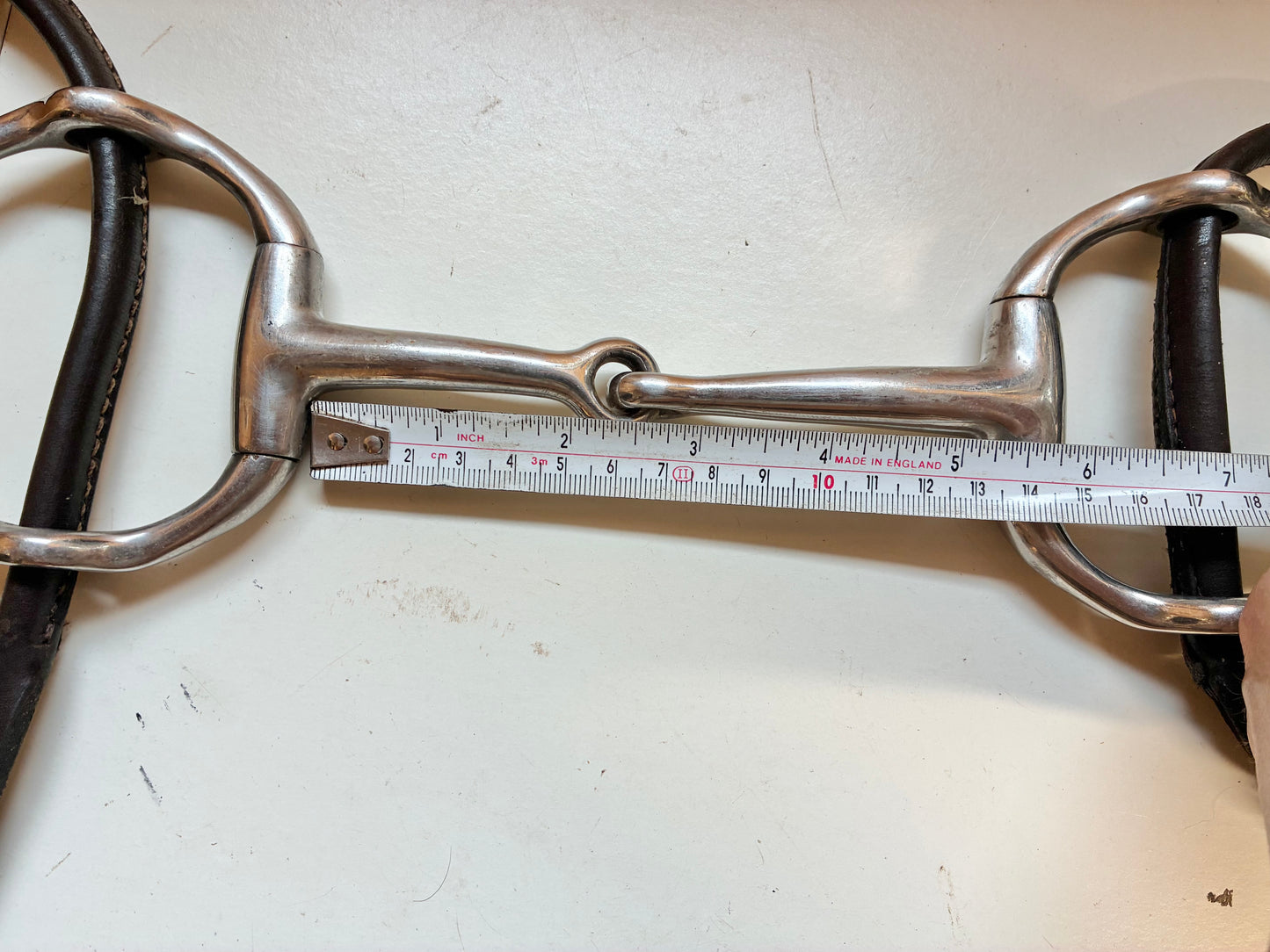 5” jointed Cheltenham gag bit with brown leather cheek pieces