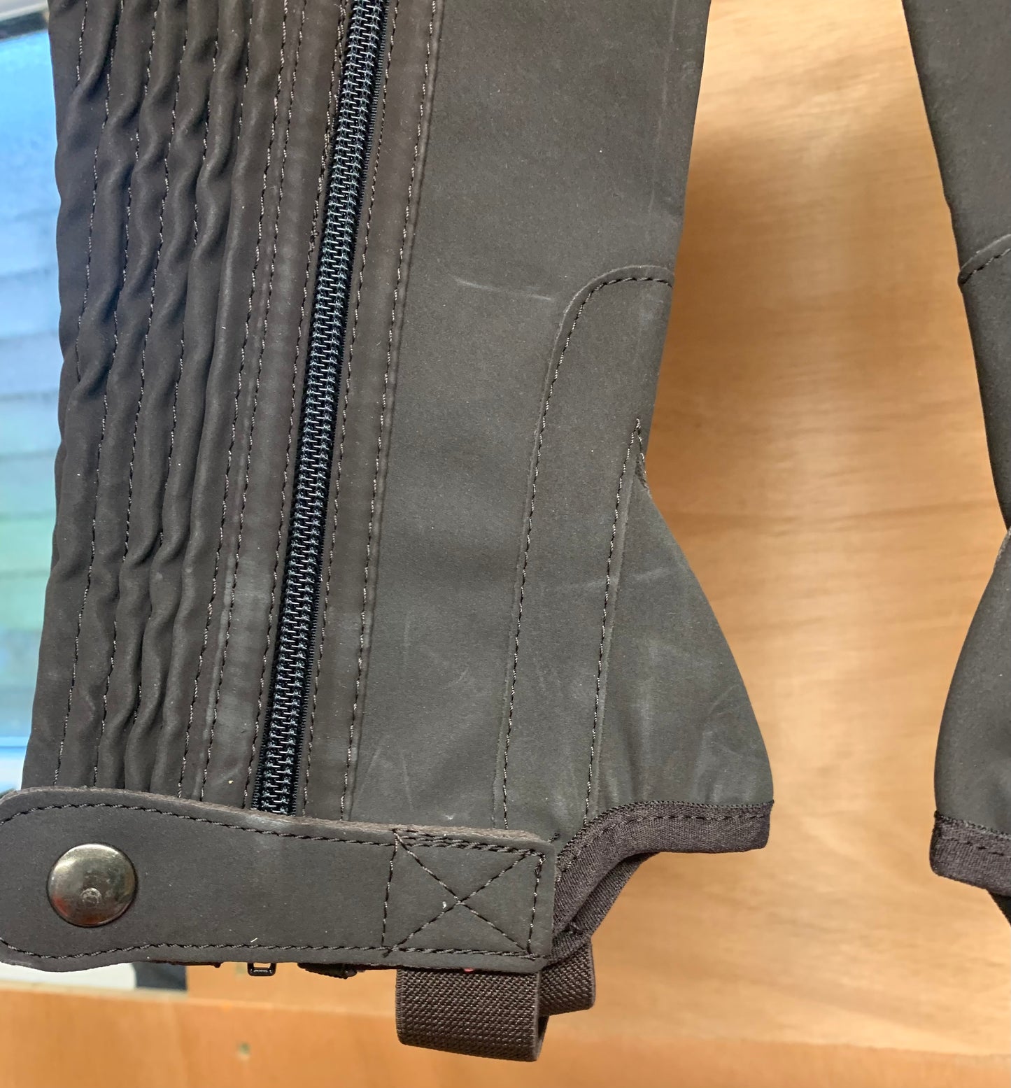 New in original packaging Childs size large brown washable half chaps
