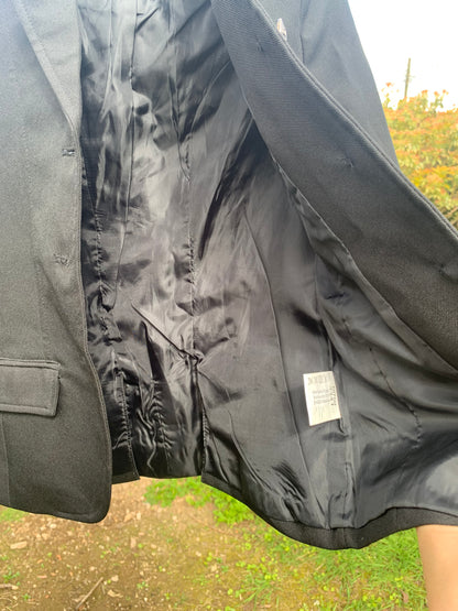 Child’s black HKM show jacket 7-8 years