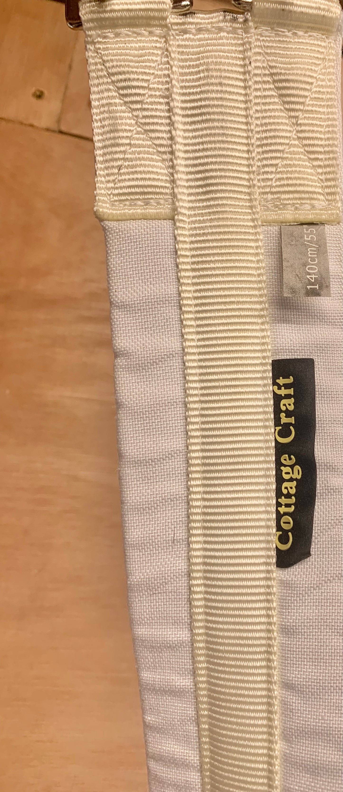 Unworn cottage craft white girth 55”