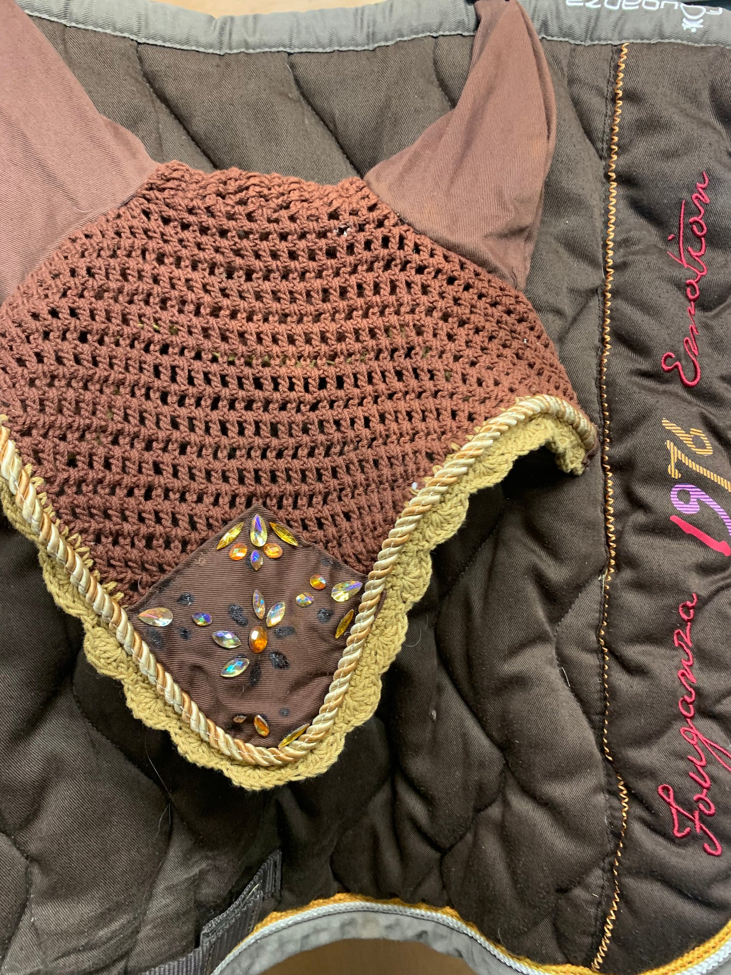 Brown & gold saddle pad and fly veil Full size