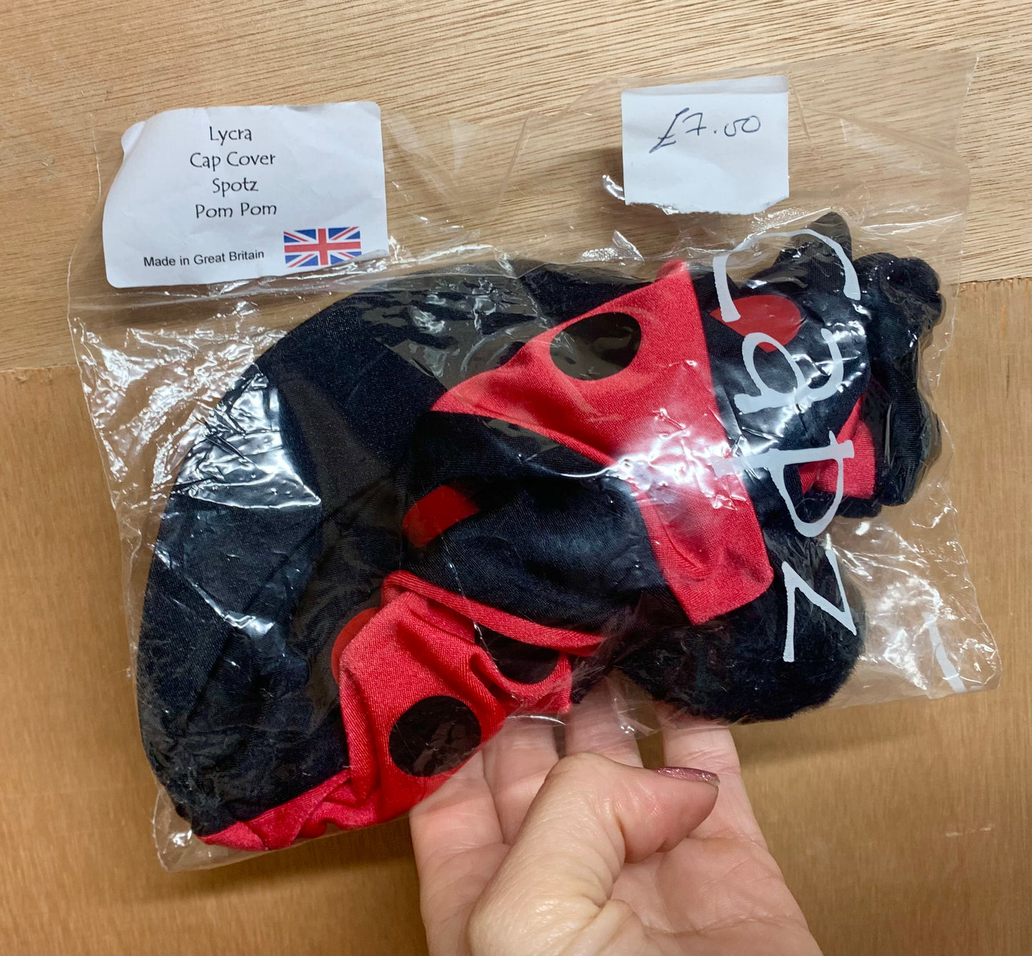 New black and red with Pom Pom Lycra hat cover by capz